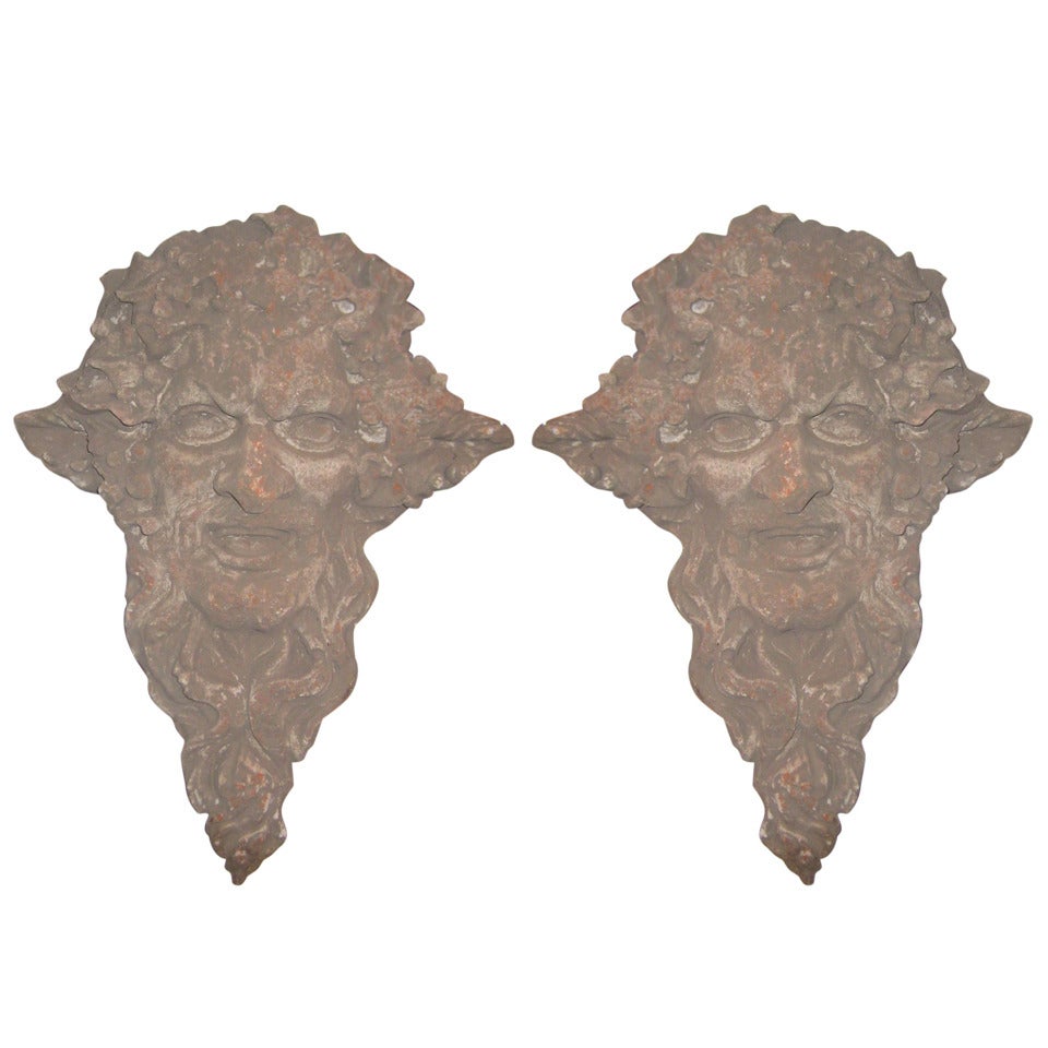 Pair of Italian cast stone masks of Bacchus For Sale