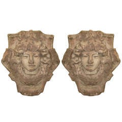 Pair of Italian cast stone heads of Medusa