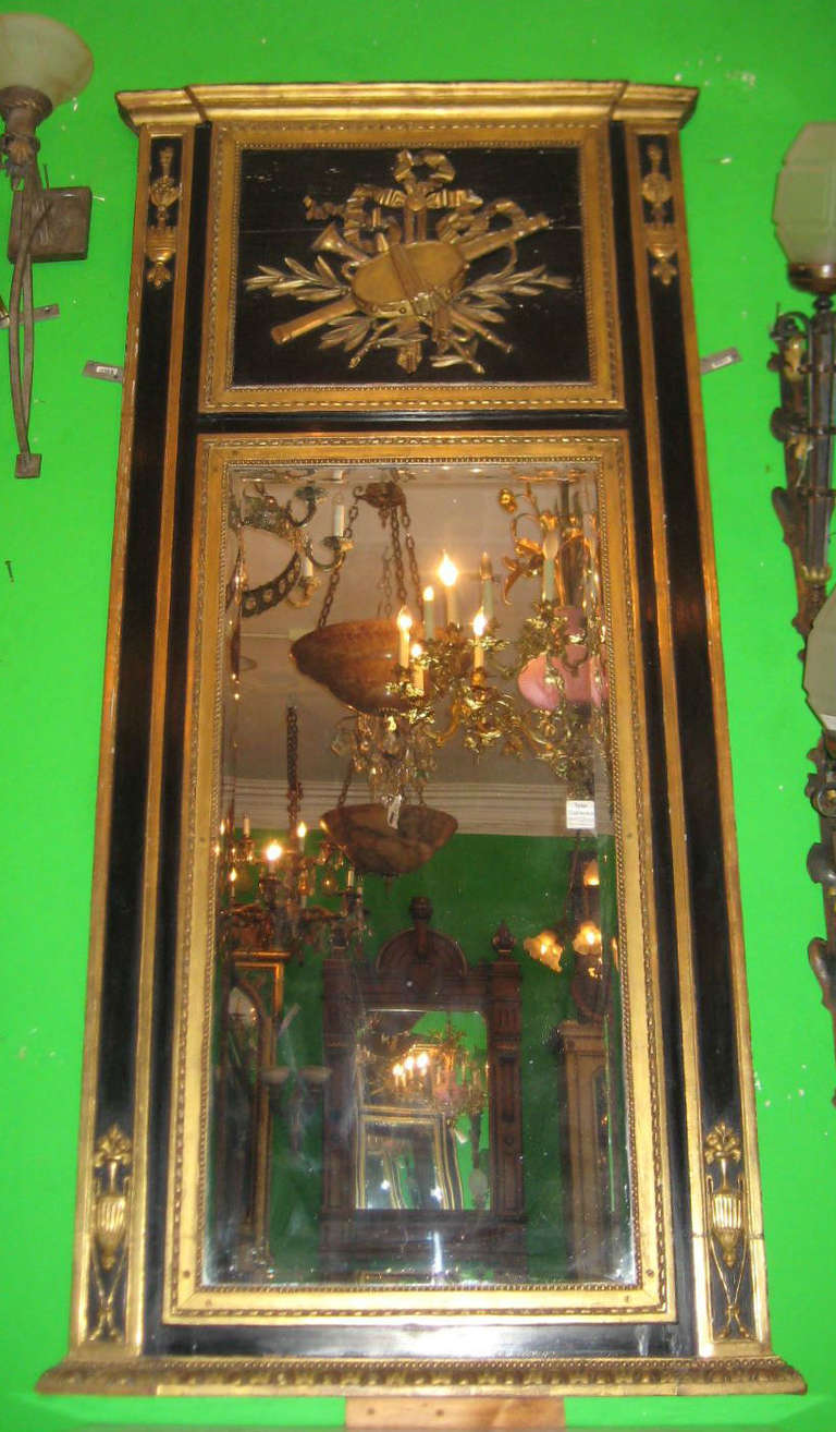 19th Century Neoclassical Black Painted and Carved Giltwood Trumeau Mirror