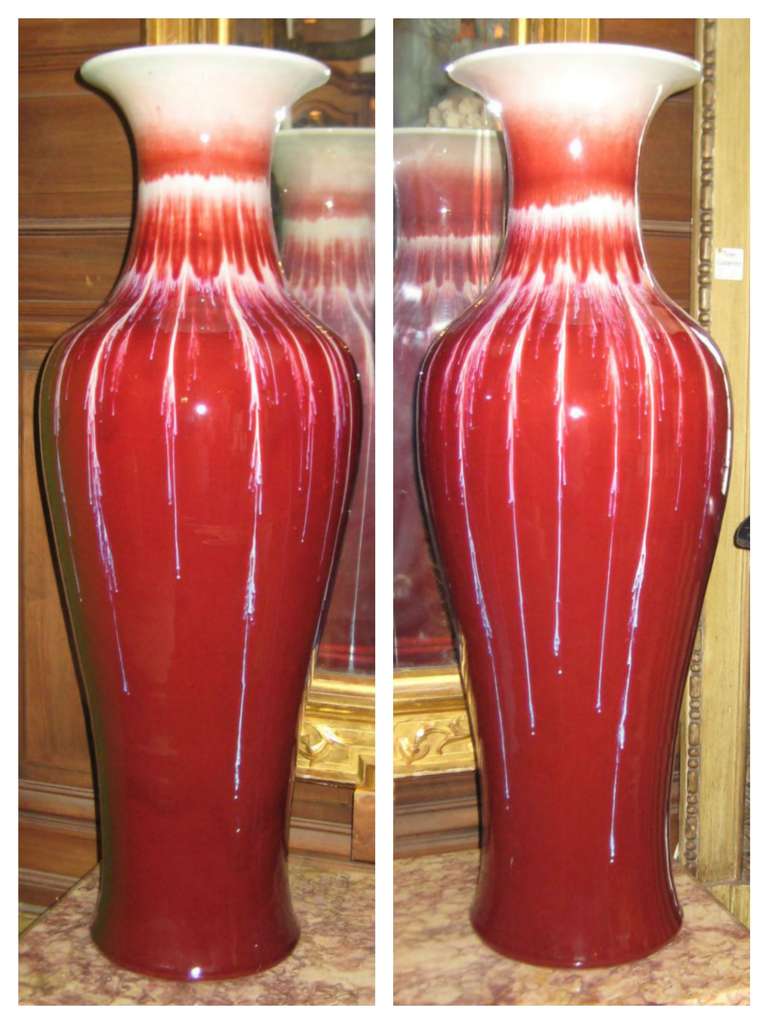 Large pair of Chinese Qing dynasty style flambe glaze baluster-form porcelain vases.