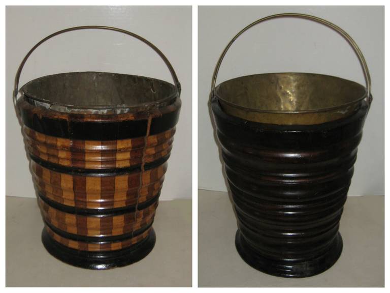 Two 19th c. Dutch Peat Buckets, one mahogany with ebonized wood trim the other beech wood with ebonized trim, both with brass bucket liners and handles.