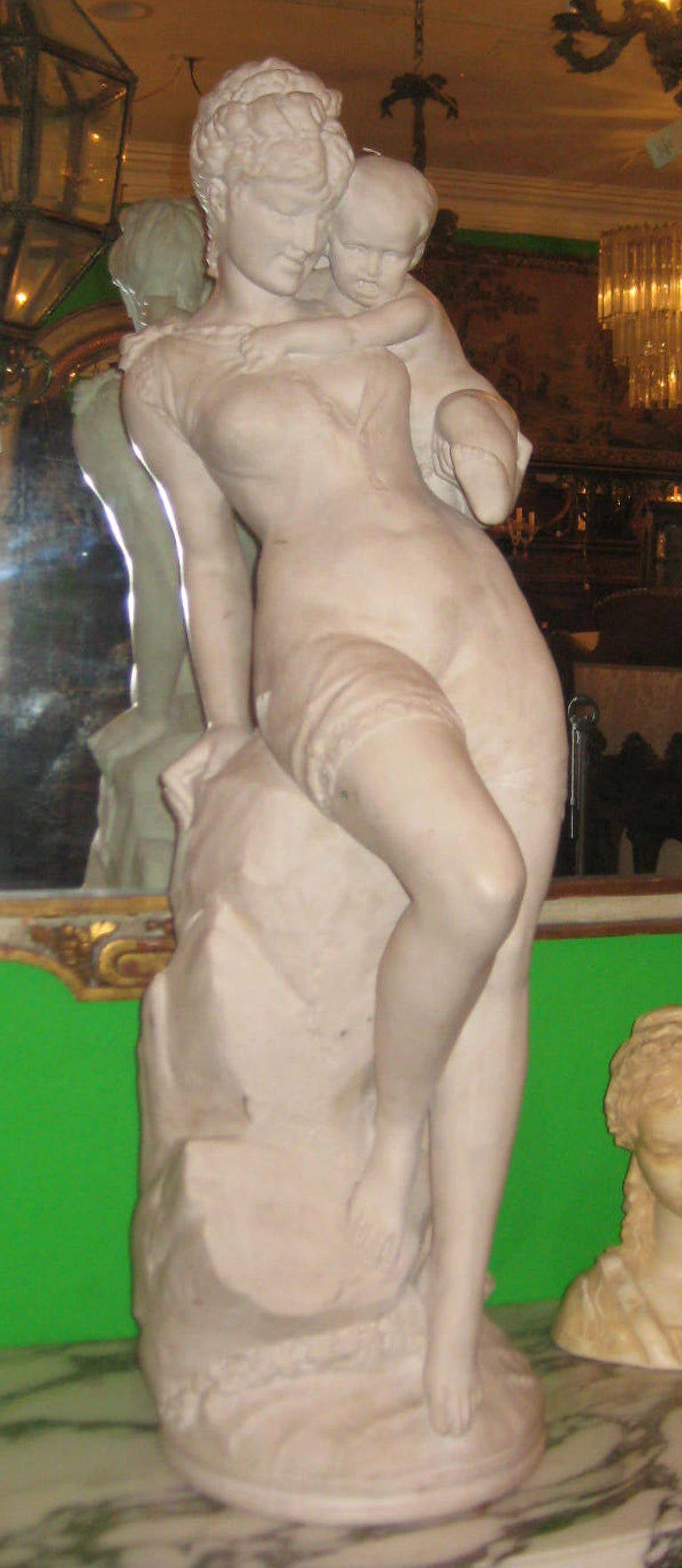 Large cultured (composite) marble sculpture of mother and child.

After 43 years of business we are retiring. Everything must be sold. Many of the pieces listed here on 1stdibs represent markdowns below our cost. We thank everyone for their