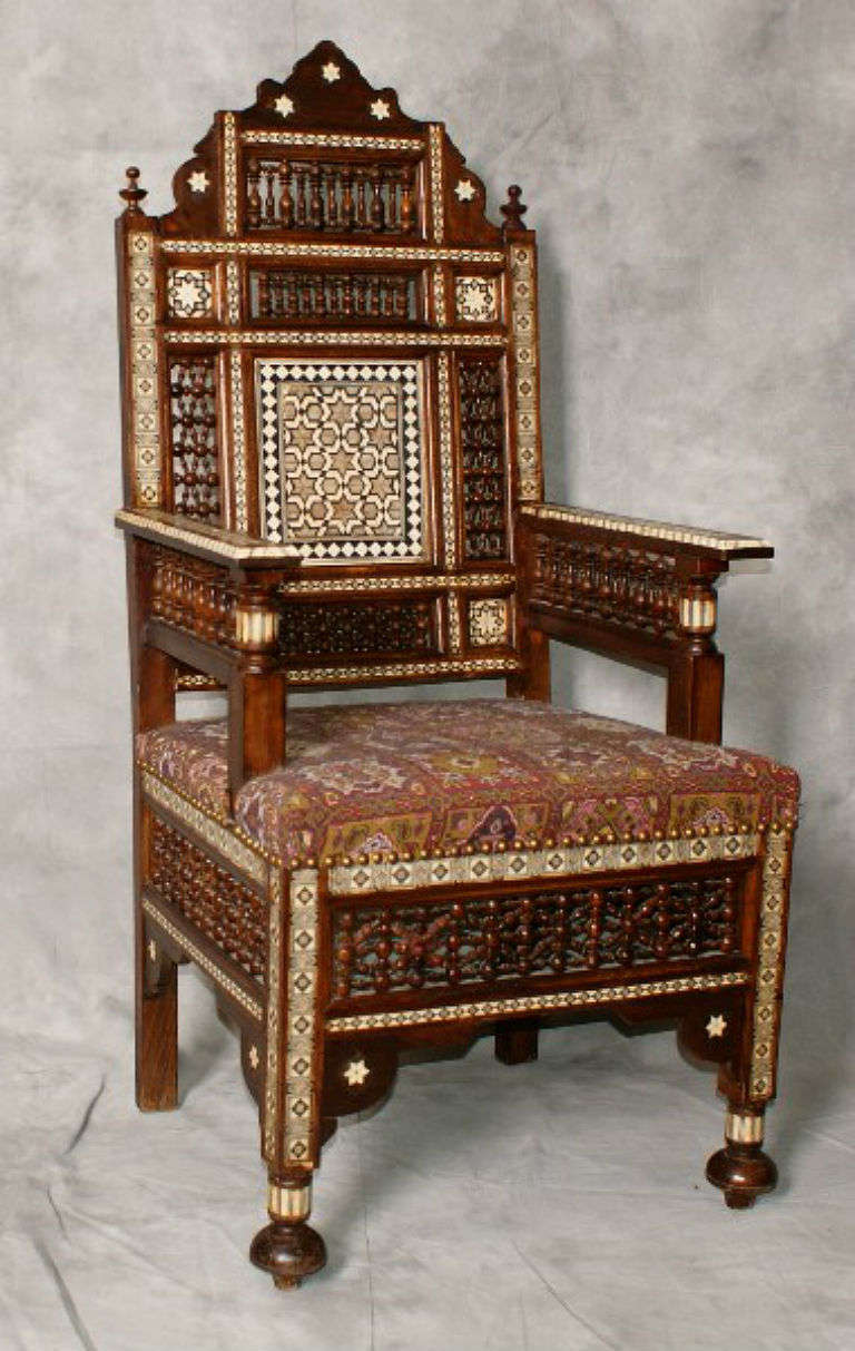 Moorish Large pair of inlaid Moroccan arm chairs.