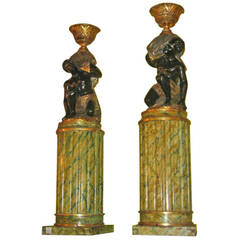 Pair of 19th Century Carved and Polychrome Figures of Blackamoors on Pedestals