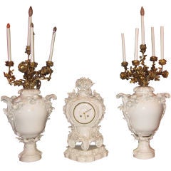 Antique Four Piece KPM Porcelain Clock Set