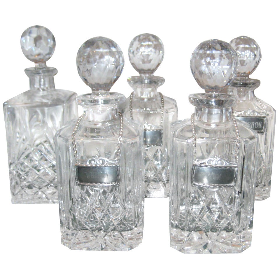 Five Crystal Decanters & Stoppers with Pewter Liquor Labels