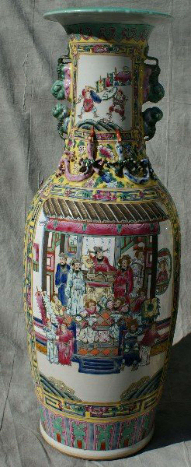 Fine pair of 19th c. Chinese famille jaune porcelain palace size vases with painted scenes of warriors.
