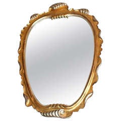 Italian carved gilt and silver gilt shell-form mirror