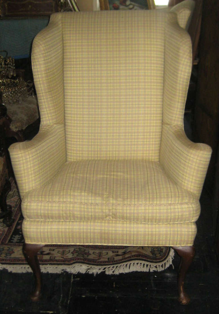 Pair of Queen Anne wing chairs with down and feather seats.
