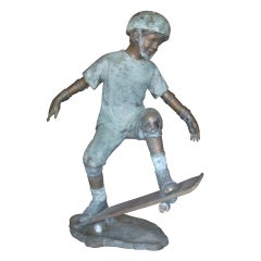 Vintage Lifesize Bronze Boy on Skateboard Sculpture by G. Mancini