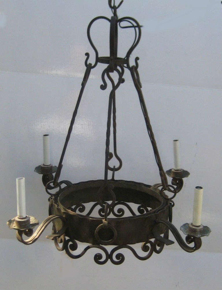 Continental iron four-light chandelier.