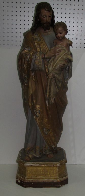 Continental carved and polychrome and parcel gilt Santos figure of Christ and child with glass eyes. H: 40