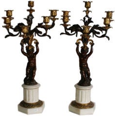 Pr  French 19th C gilt and patinated bronze figural candleabras