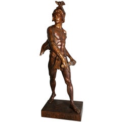 Life-size bronze statue of a warrior signed on base: E. Picault