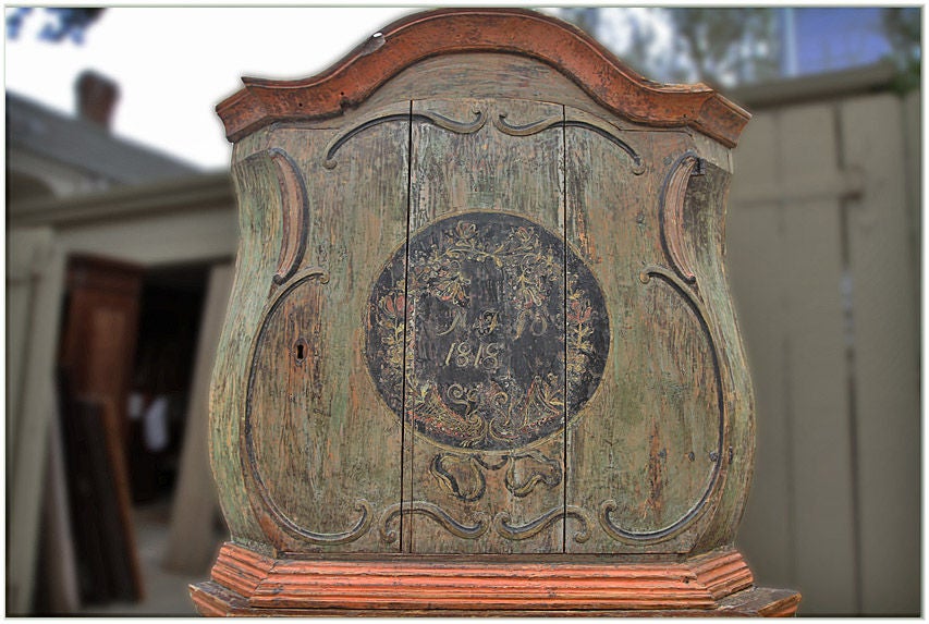 18TH CENTURY SWEDISH PAINTED CORNER CABINET GIVEN AS A MARRIAGE GIFT IN 1818.  IT HAS ORIGINAL HARDWARE WITH A LARGE PORTION OF ORIGINAL PAINT REMAINING <br />
H 80¼