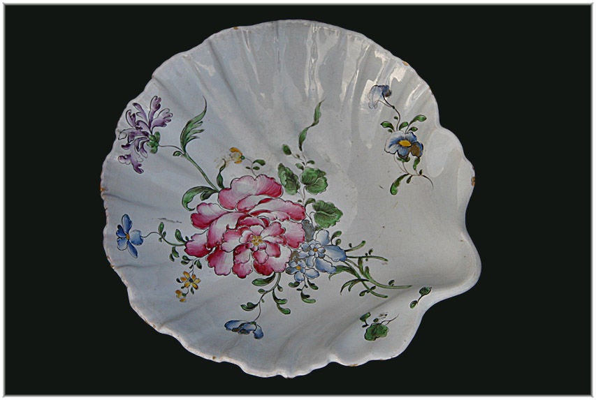 STRASBOURG COQUILLE SHELL SHAPED DISH.  MARKED JH 722. FROM THE PERIOD OF JOSEPH HONNONG.  CIRCA 1760.  <br />
8½