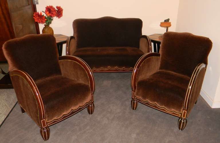 Here is another quality restoration.  We have taken our time and given this wonderful sofa suite a complete makeover.  The original restored Art Deco wood frames are magnificent. Beautiful deep brown Mahogany wood with white bone inlay and scalloped