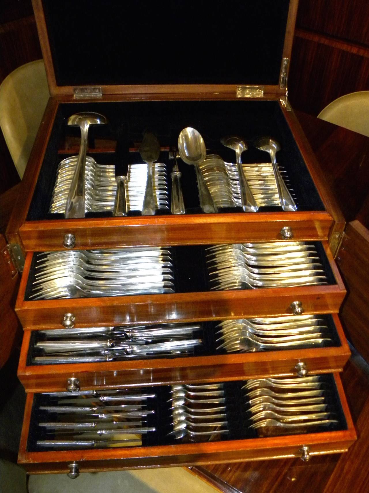 Classic Art Deco complete set of silverware, 165 pieces in total by Plata Lappas. This pattern is called “Normandie” and it includes service for 12 (with 13 pieces per place setting), plus nine serving pieces all in a fitted storage box with four