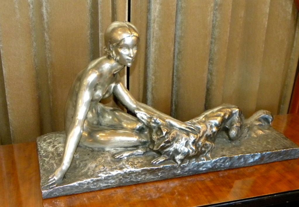 Large French very high quality Bronze figural group of a lady and Borzois dog.  The piece is quite impressive, the woman stares out into the world as the dogs stares at the woman?  The details in the piece are great, very deep bronze work and lots