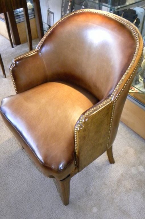This is a wonderful chair. We just completed a perfect restoration showing some restraint to help maintain this original SOLID wood in Oak and burl chair. This chair is very heavy and really well made. Would make a great office chair, side chair or