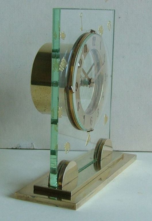 This really is a fabulous Art Deco clock, the like of which I've never seen before and I've had literally hundreds of Art Deco clocks through my hands over the years. I would imagine it must have been a special order from a very high end shop to be