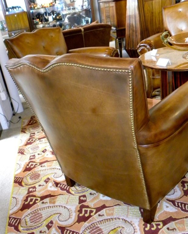 Spectacular French inspired  Mustache Club chairs 1