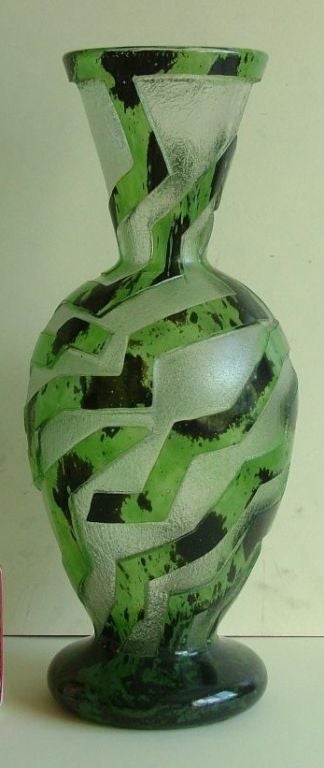 A spectacular Degue acid etched cameo glass vase, striking shape and colors with a great geometric modernist pattern. Pieces of this quality do not come around often, its been years since I bought a piece as nice as this. A super collector piece,