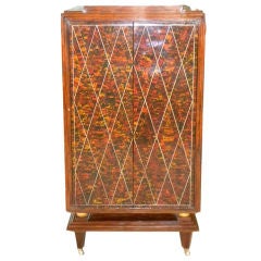 Stylish French stepped rosewood bar with a stunning Lelu style