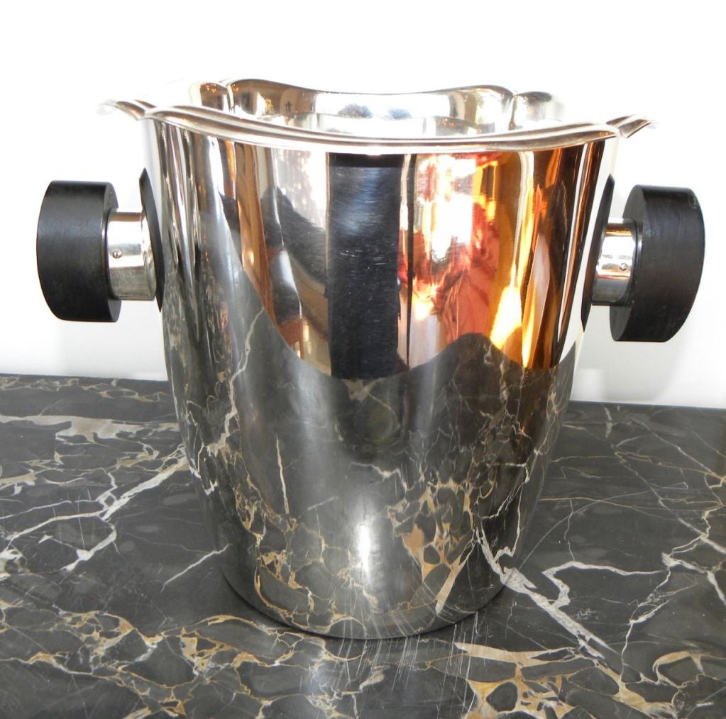 This wonderful newly chromed WMF wine/Champagne bucket is sharp and stylish. Just newly excellent restored condition. The ebony wood handles securely allow you to handle this little pleasure either filled or empty. Great signature on the bottom,
