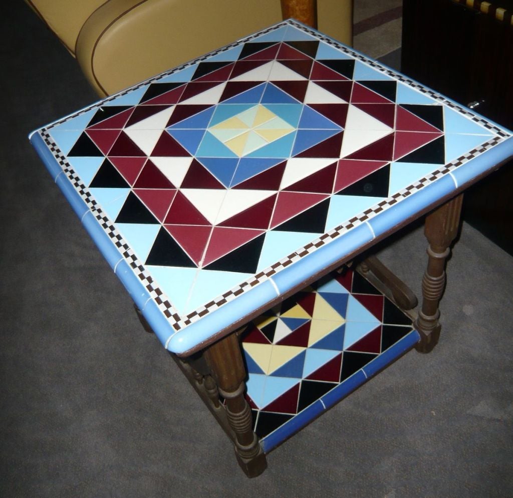 I just love this piece. The color and quality of the tile is from that great period of Art Deco (daze gone by). Look at all the colors and the intricate tile pattern. Wow you don't see these table very often. Sure, lots of Mission style tables, by