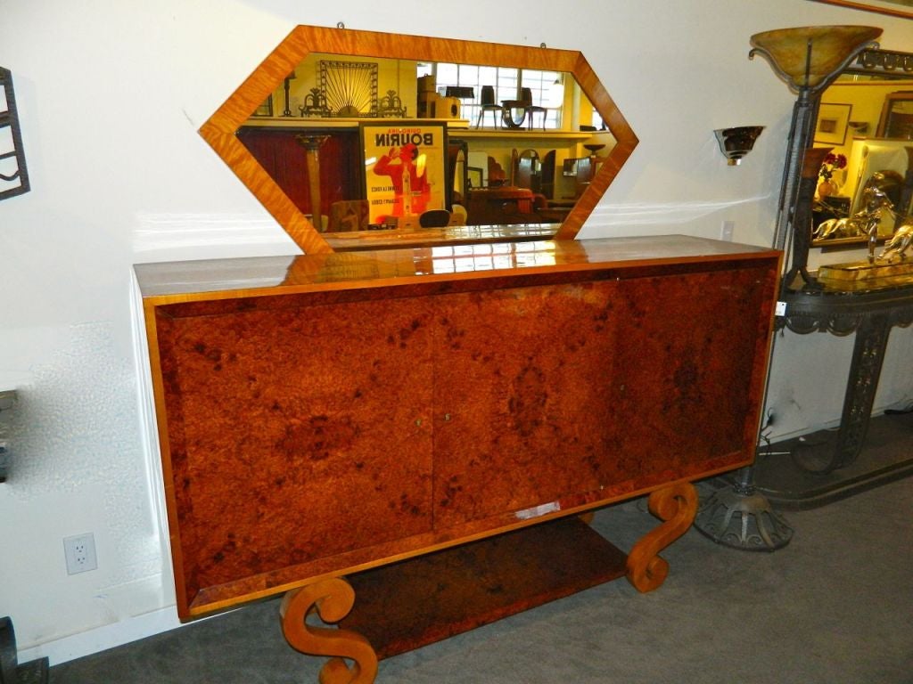 Outrageous Amboyna burl wood buffet with a 1940s point of view. Great looking piece, must be original design with great interior storage all with working storage drawers etc. French design on unusual S shaped angled legs. Beautiful French polish