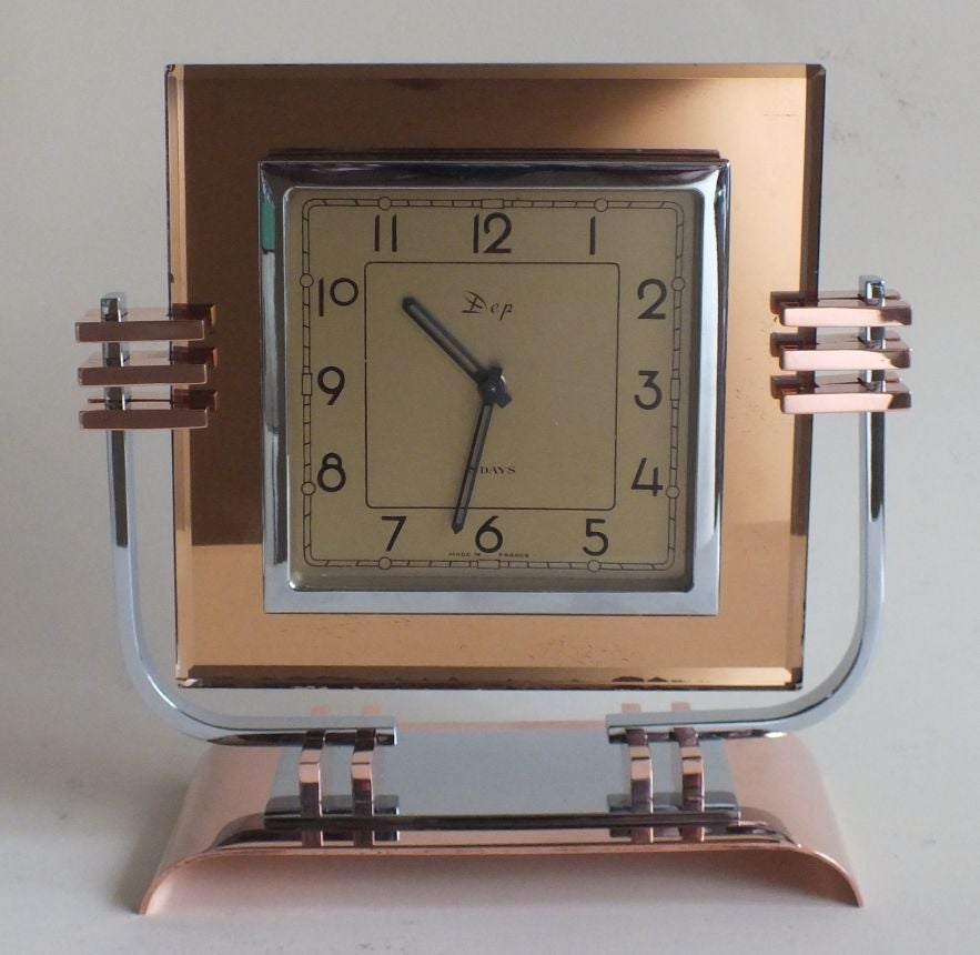 The very very streamlined 8 day Dep clock all beautifully finished and has been fully restored. Fresh copper and nickel plating. with and movement fully serviced.  A wonderful clock with so many fine details of design. Copper base with shiny chrome