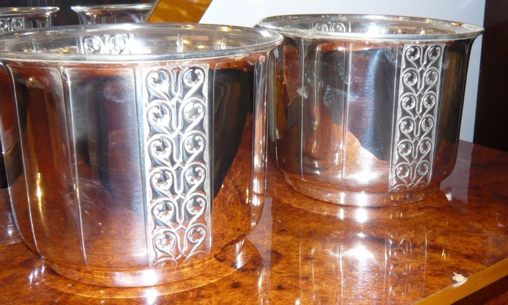 I love to find things in pairs, it doesn't happen often. I believe we have here a pair of silver plated jardinières most likely of German origin and maybe WMF! There has been some restoration done to them and what you see is newly restored silver