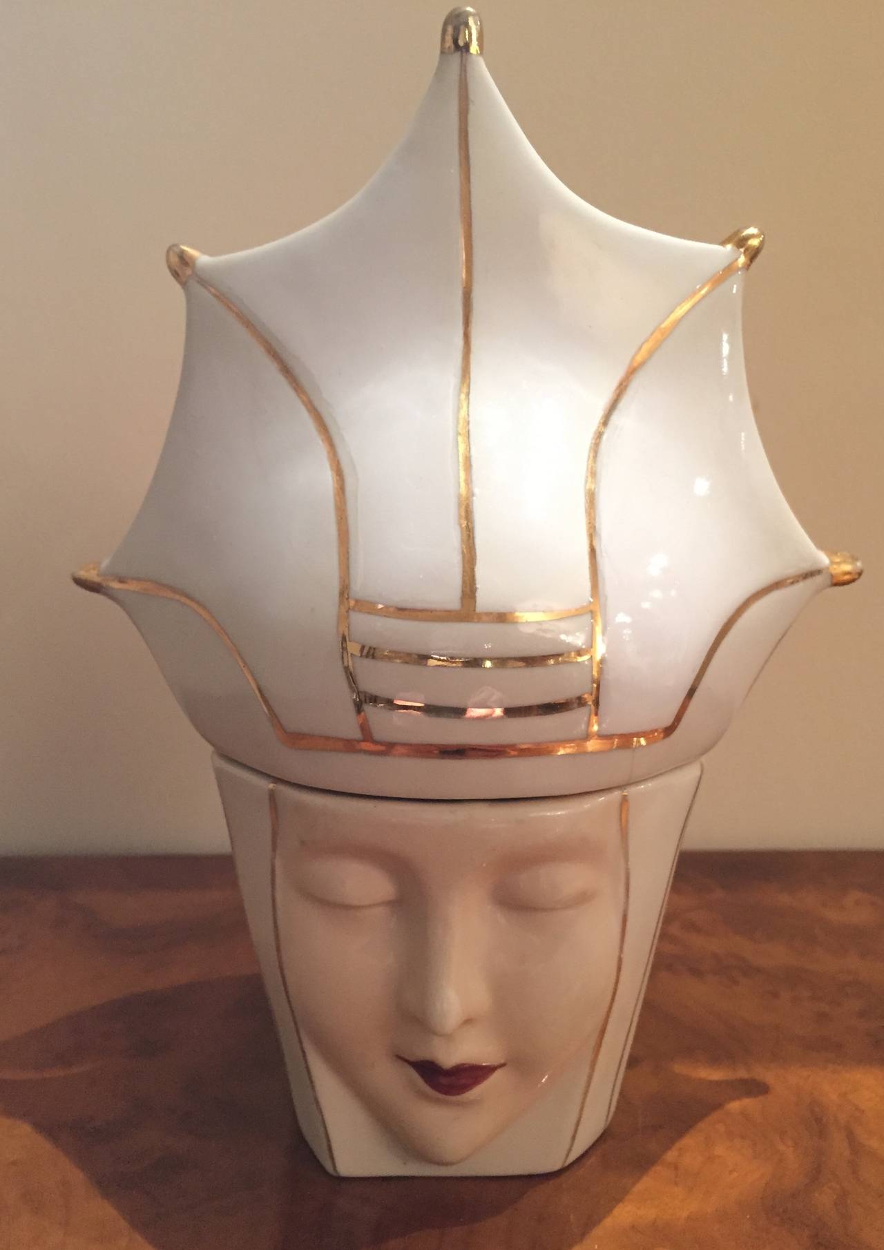 Original condition Robj decorative ceramics bon bon ceramic from the period of 1925-1930. Woman with crown and gold lines. This figure is beautifully rendered with two parts, top and bottom. 
 
Jean Born began his work in 1908 under the name he
