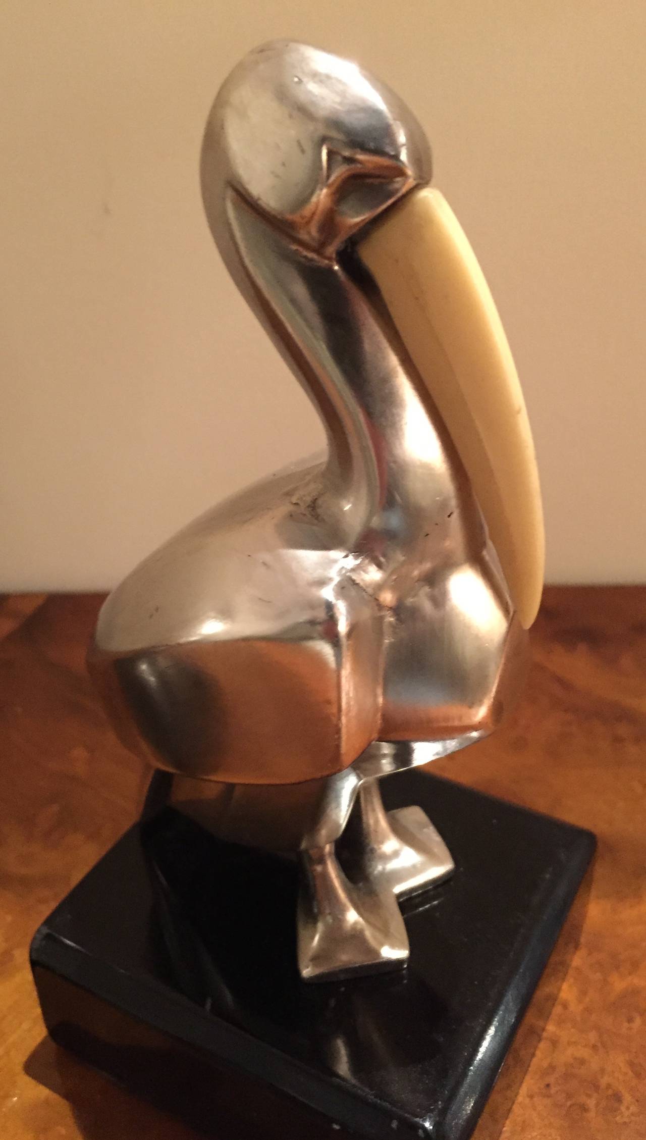 Mid-20th Century Silvered Pelikan Bookend Statues