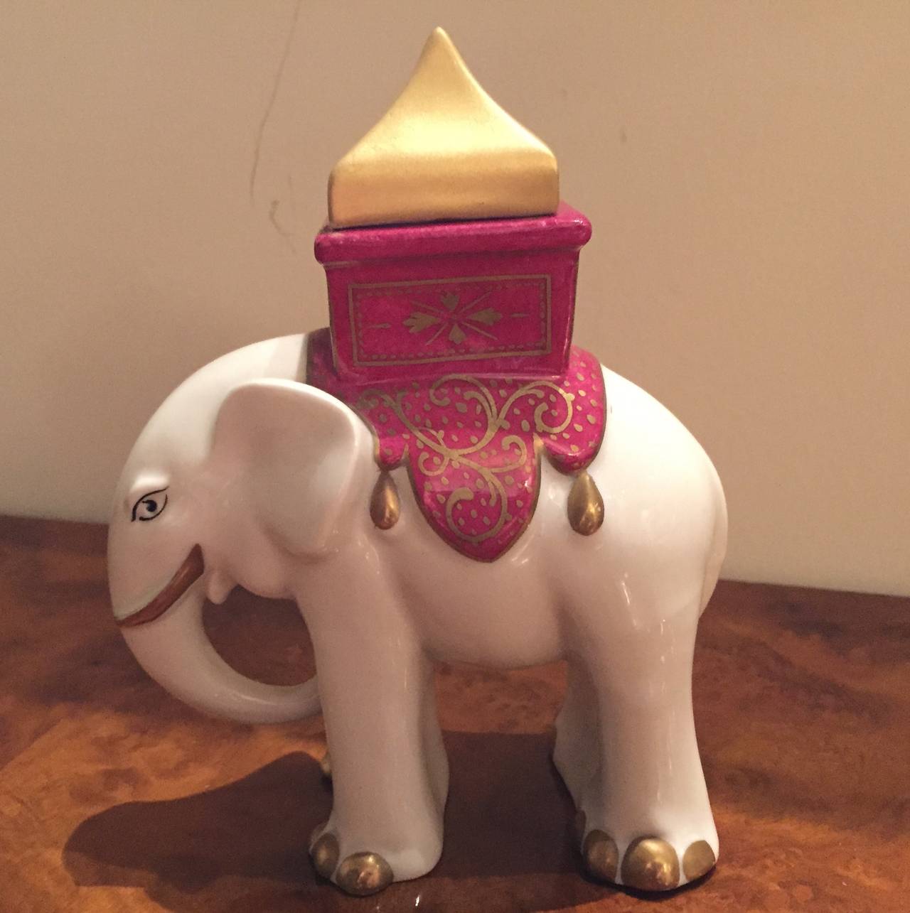Robj Ceramic Elephant sculpture made in Paris and part of the collection of many figurines, jars that were stylized during this period.

Jean Born began his work in 1908 under the name he created, ROBJ. An industrial designer through the ‘teens,