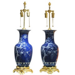 A PAIR OF VASES MOUNTED AS TABLE LAMPS. CHINESE, CIRCA 1920