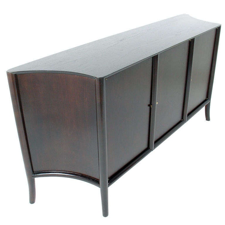 Curvaceous Credenza, designed by T.H. Robsjohn Gibbings for Widdicomb, circa 1950's. This credenza is currently being refinished and can be finished in your choice of color. The price noted below includes refinishing. It can be finished in an