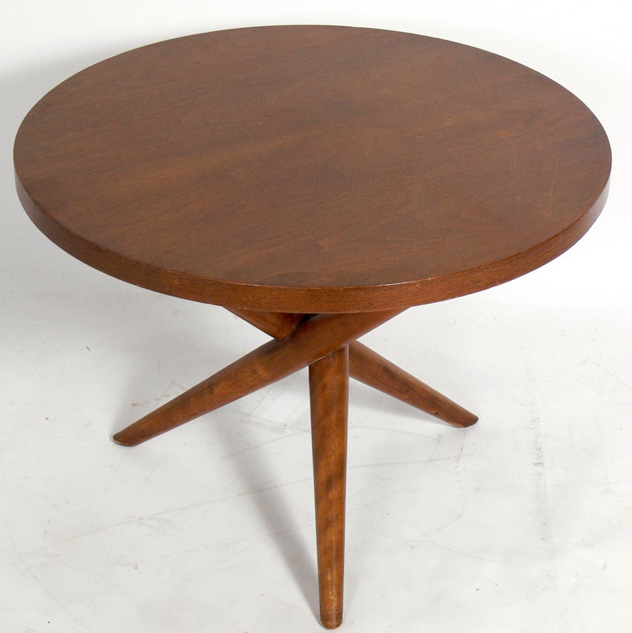 Sculptural Tripod Table, designed by T.H. Robsjohn Gibbings for Widdicomb, circa 1950s. Very sculptural splayed tripod form, yet strong and sturdy. It is a versatile size and could be used as a side or end table, night stand, or coffee table. This