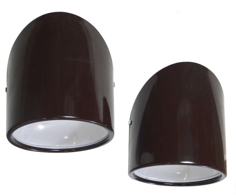 Pair of Angular Modern Sconces, designed by Cini Boeri for Arteluce, Italy, designed circa 1971, these examples are probably circa 1980's. Sculptural angular forms in a deep brown color. They are NEW in their original box with original hang tag. See