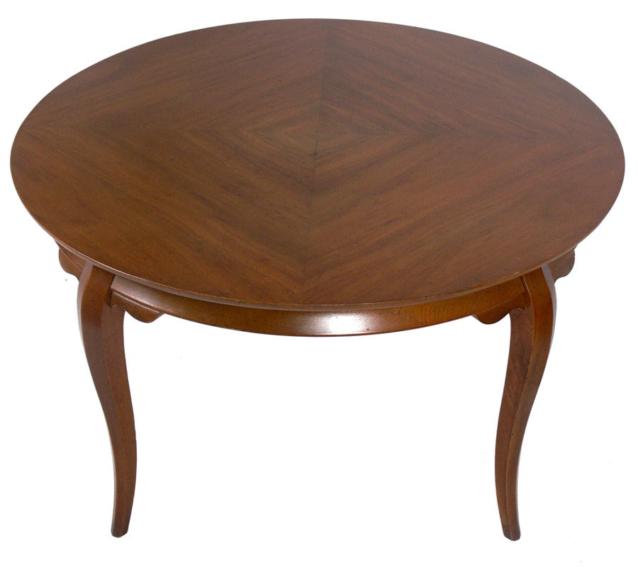 Elegant Game Table with Curvaceous Legs and Bookmatched Walnut Top, American, circa 1950's. This piece is currently being refinished and can be completed in your choice of color. The price noted below INCLUDES refinishing in your choice of color.