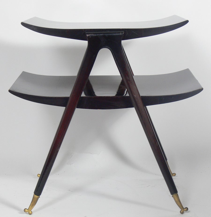Pair of Curvaceous End Tables in the manner of Gio Ponti, Italian, circa 1950's. These pieces are a versatile size and can be used as side or end tables, or as night stands. They are currently being refinished and can be completed in your choice of