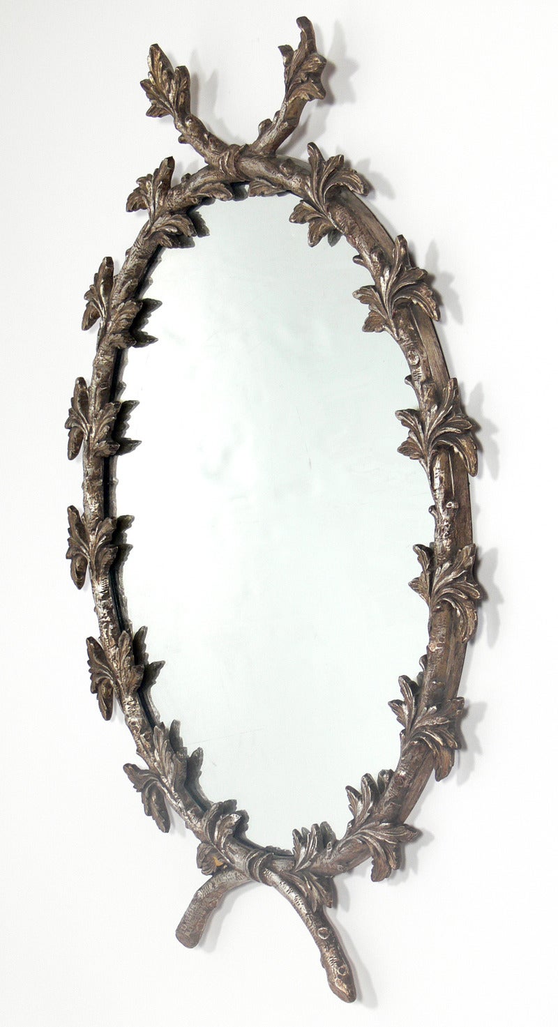 Silver Leaf Branches Mirror, circa 1940's. Wonderful patina to both the silver leaf frame and original mirrored glass.