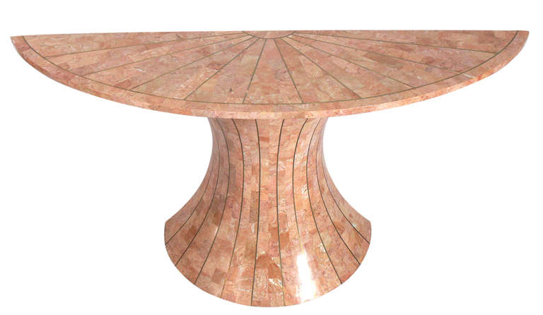 Tessellated Stone Demilune Console, designed for Maitland Smith, circa 1980's. This piece is constructed of tessellated salmon color stone veneer with inlaid brass. It is a versatile size and can be used as a console, entry, or hall table, or as a