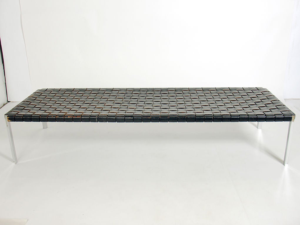 Large Scale Woven Leather and Chrome Daybed or Bench, designed by Erwin and Estelle Laverne, American, circa 1960's. It is a versatile size and can be used as daybed or large scale bench in a home or gallery setting.<br />
<br />
Blanket wrap