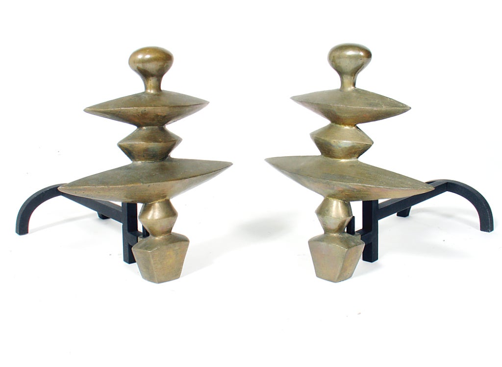 Pair of Sculptural Bronze Andirons designed by Diego Giacometti. This pair of Giacometti designed andirons is from a limited edition cast from the collection of Nelson Rockefeller, circa 1985. Stamped with the edition markings underneath. Vintage