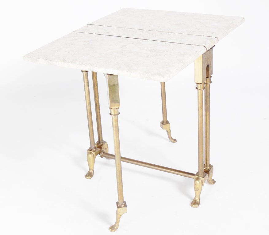 Italian Marble and Brass Folding Table, Italy, circa 1960's. This is a versatile piece and can be used as an occasional table for entertaining and folded down flat when not in use. Retains wonderful original patina.