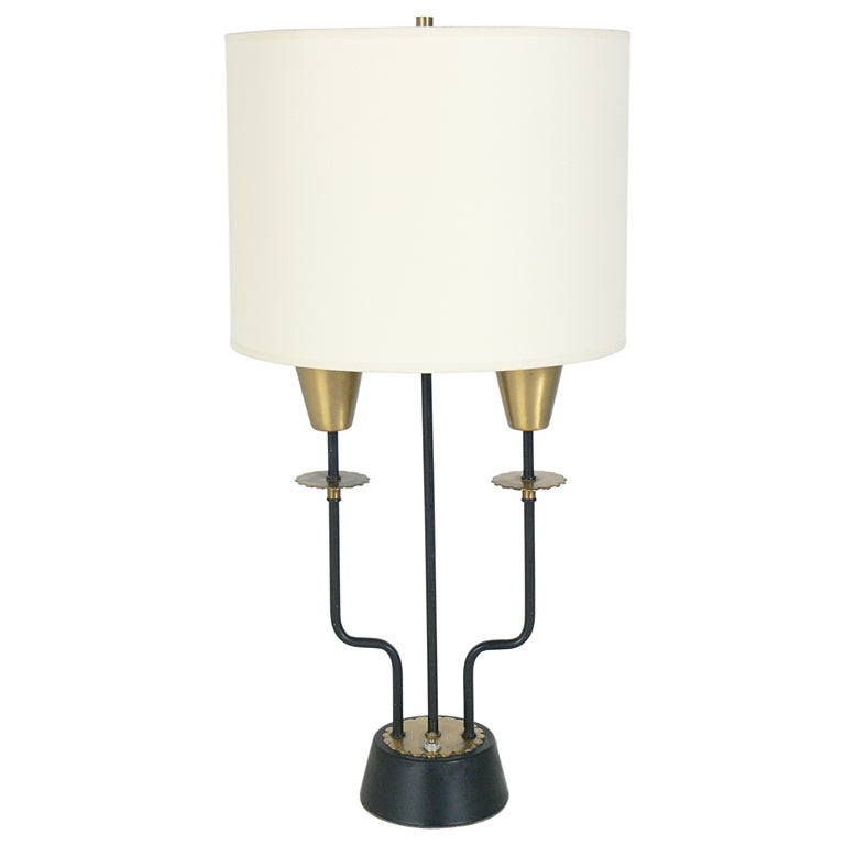 Pair of Elegant Modern Lamps, American, circa 1950's. They retain their original patina. The price noted in this listing includes the pair of lamps and shades.