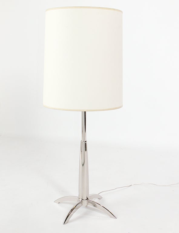 Pair of Sleek Nickel Plated Lamps, designed by Stiffel, circa 1960's. Very sculptural space age form. Price noted in this listing is for the pair of lamps and shades. They have been replated and rewired and are ready to use.