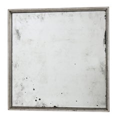 Antiqued Mirror in Graduated Square Silver Leaf Frame